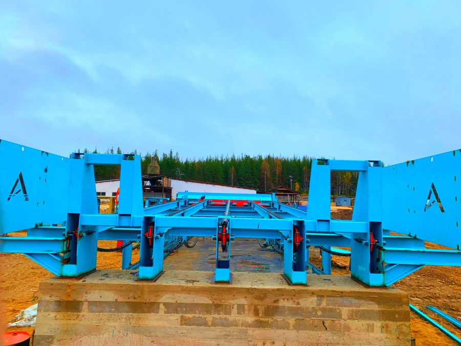 Receiving cross table log conveyor