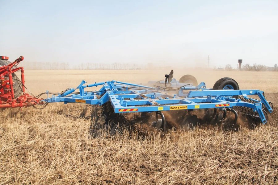 Semi-trailed disc harrow DANA BDP-4*4M and its modifications: BDP-4*4M RZZ.18.00.000 (with spiral roller); BDP-4*4M RZZ.18.00.0
