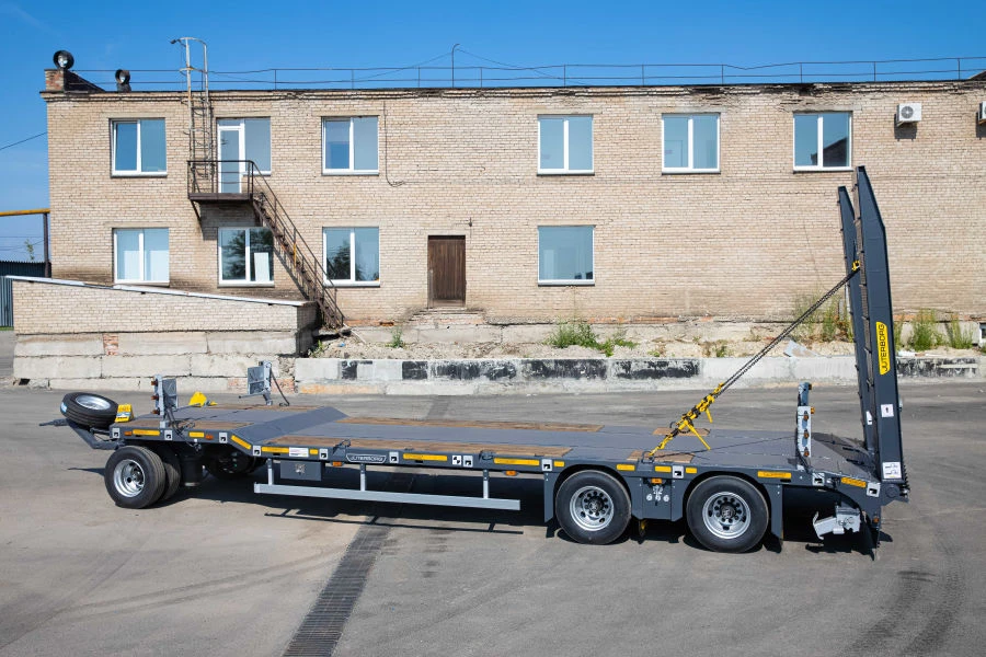 Specialised heavy haulage trailer 88523 in modifications 88523-03, 88523-04 variant with metal platform, with spikes, with pneum