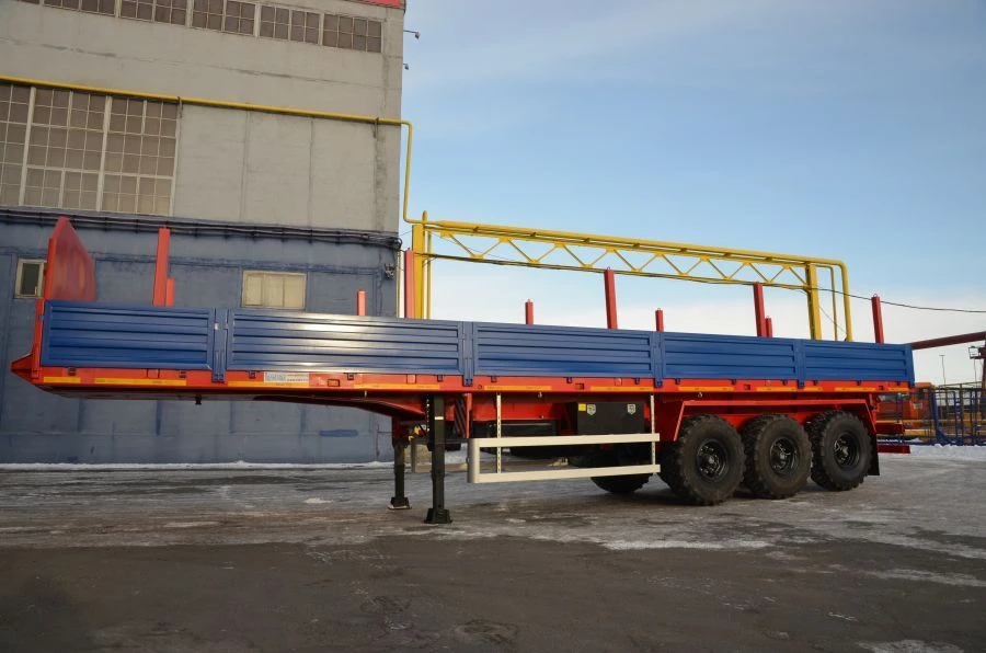 Semitrailer Politrans 94171-031. In the version: metal platform with decking, with pneumatic suspension. Axles manufactured by "