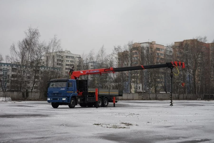 Special-purpose vehicle with hydraulic loading crane of MKMA type on the basis of KAMAZ 65117 and its modifications 64K06N-U1