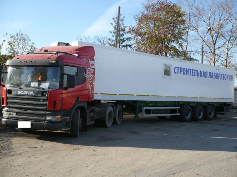 Isothermal three-axle semi-trailer for transporting workshop, laboratory, club, motor home, office equipment, modification 871.