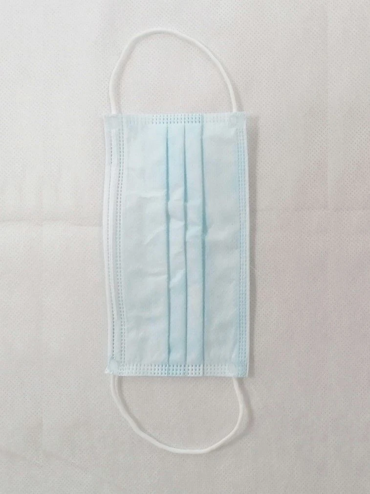 Disposable surgical mask on elastic bands