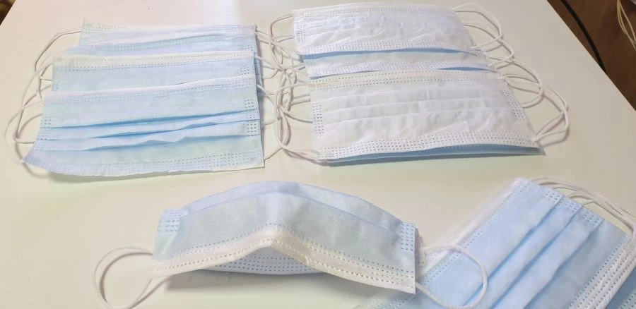 Medical disposable masks made of nonwoven materials, three-layer