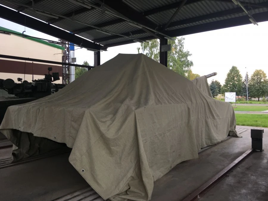 Covering tarpaulins, wagon tarpaulins, covers, canopies made of textile materials, including those for law enforcement agencies