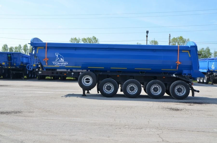 Dump semi-trailer of Tonar 952345 model with axles of TONAR models 90422, 90424, 90431.