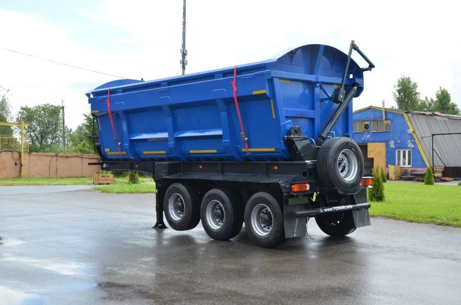 Dump semi-trailer of Tonar 95239 model with axles of TONAR models 90422, 90424, 90431.