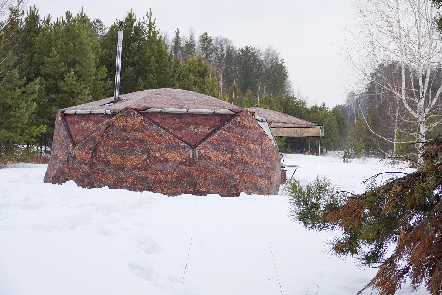 Winter camp with stove running