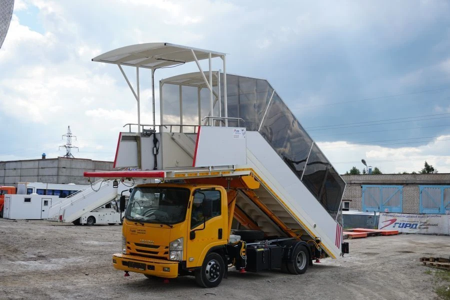 Self-propelled passenger ramp TSP-GIRD on ISUZU chassis NPR75L-H, NPR75L-K, NPR75L-L, NPR75L-M. GIRD brand. Type 5765N. Modifica