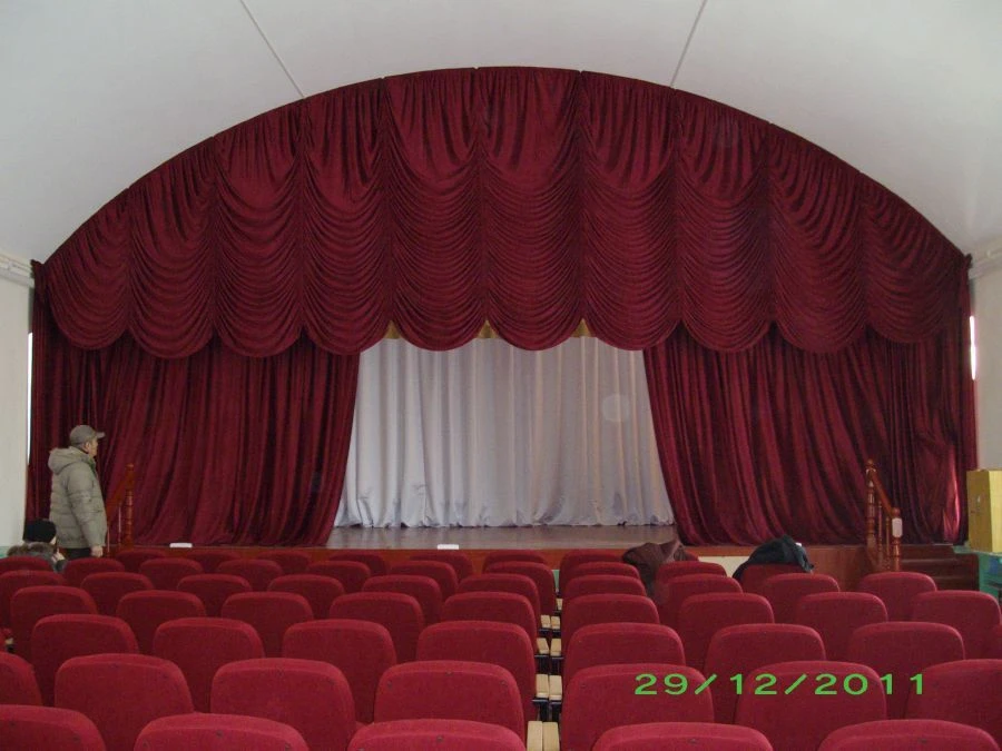 Harlequin stage with swags (upper part of the front stage curtain hiding the stage structure)