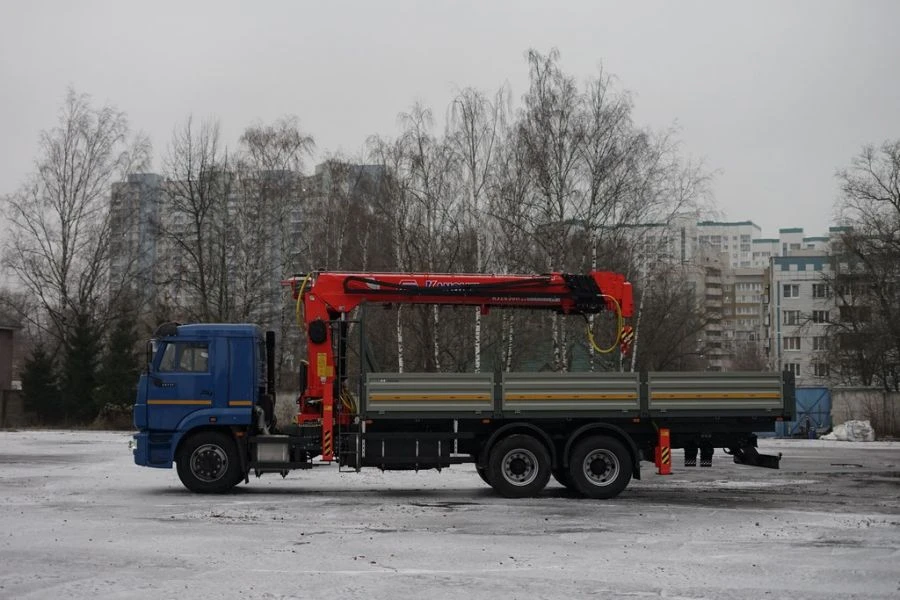 Special-purpose vehicle with MKMA type hydraulic loading crane on the basis of KAMAZ 65117 and its modifications 64K14N-UH