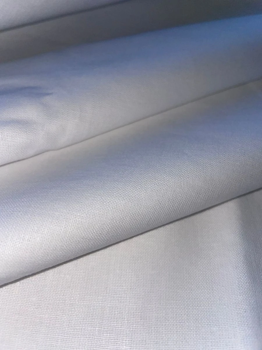 Cotton plain weave calico fabric of the art.1123 bleached, surface density 142+7 g/sq.m, width150+2,5 cm