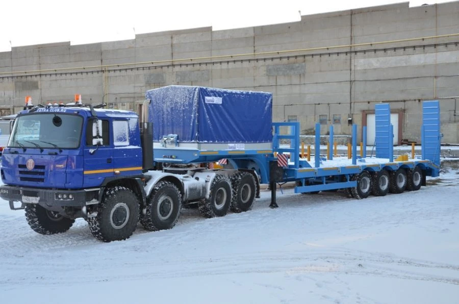 Semitrailer Politrans 94165-040. Wheel axle "Plant" 1201-2410002. Tyre 385/65R22,5. In version: platform with straight load p