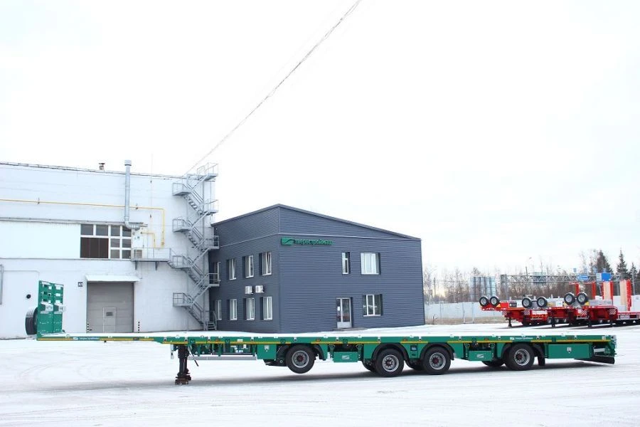 Semitrailer Tverstroimash 993941, modification 0022, platform variant with fittings, with attached ladders