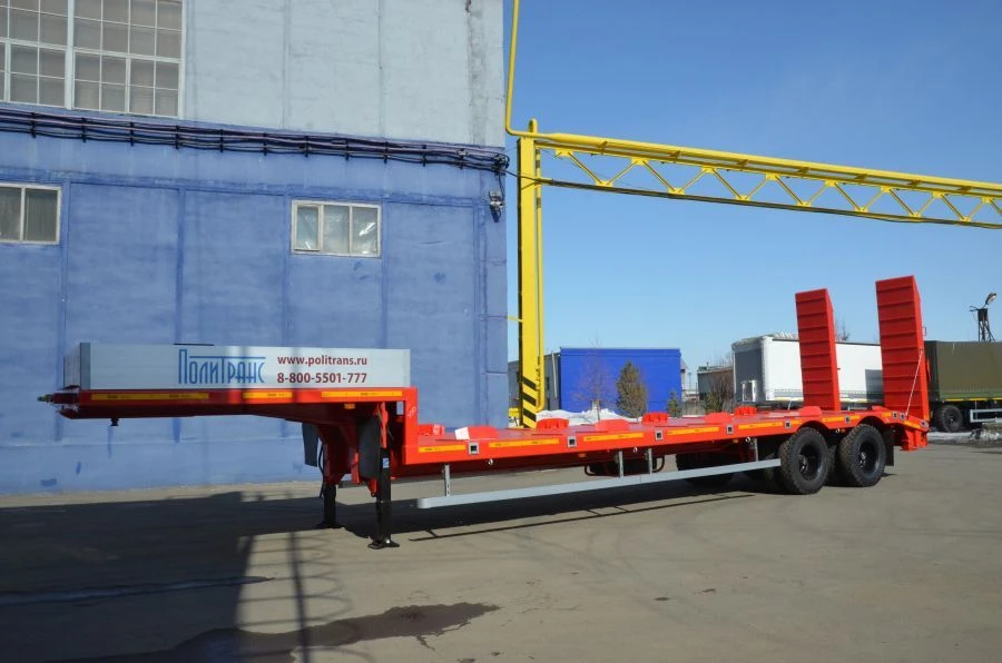 Semitrailer-heavy hauler Politrans 94161-010. In the version: metal platform with a straight load platform, with ladders, on a s