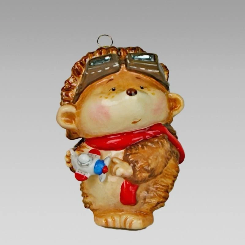 Handmade glass Christmas tree toy "Hedgehog with brown aeroplane"