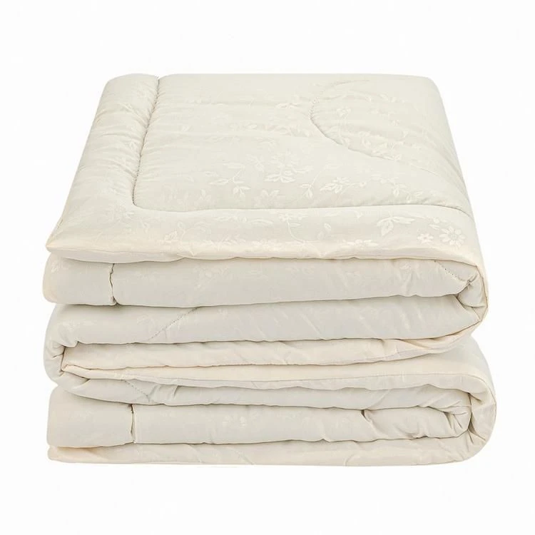 Quilted blankets made of cotton fabrics of top with synthetic fibre filling
