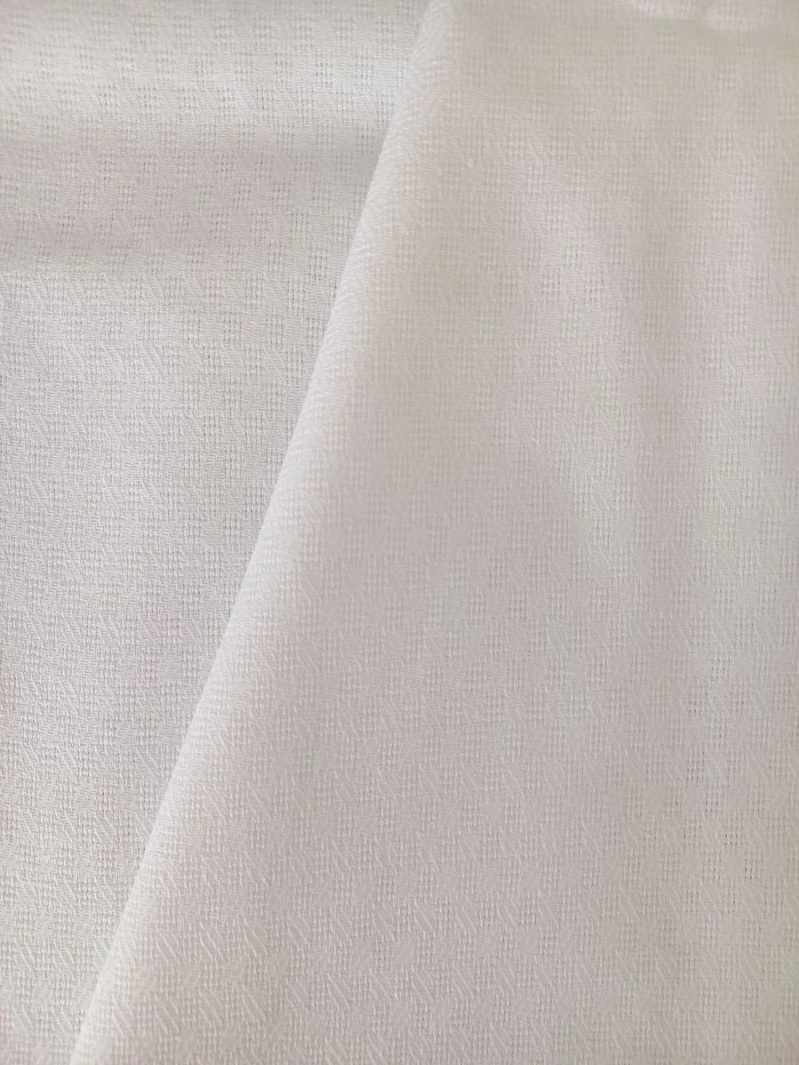 Cotton fabric of combined weave "Snowflake" with oil-repellent impregnation, not visible to the naked eye, bleached