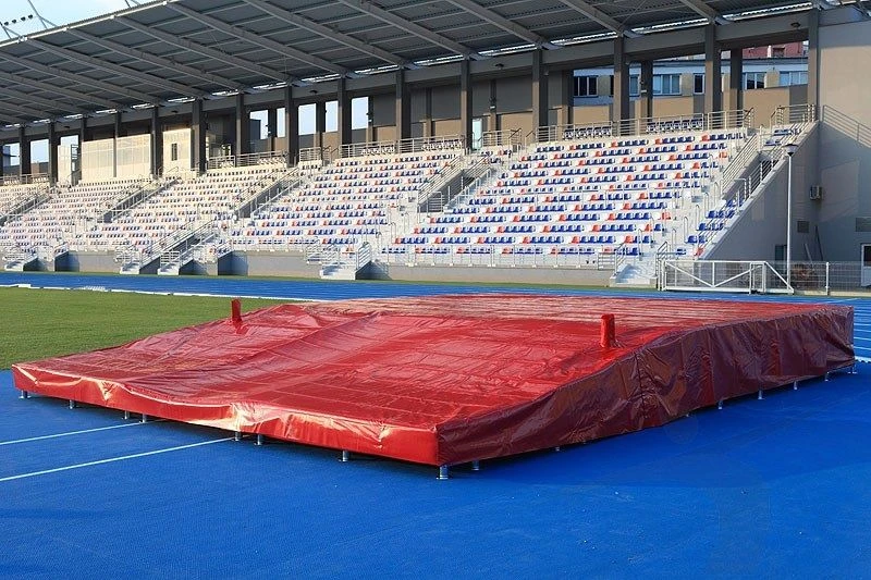 Waterproof cover for pole vaulting landing places.