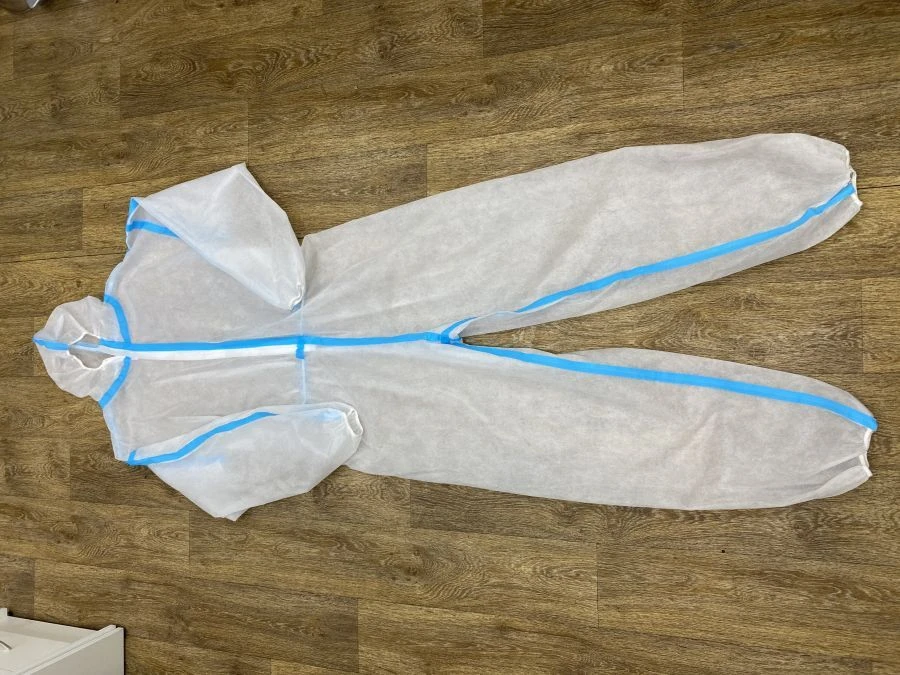 Set No. 4 consisting of: Overalls, Shoe covers, Instructions for use