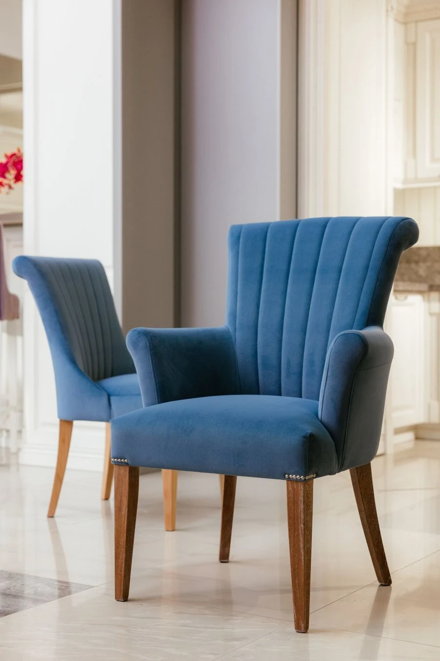 Chair with solid armrests