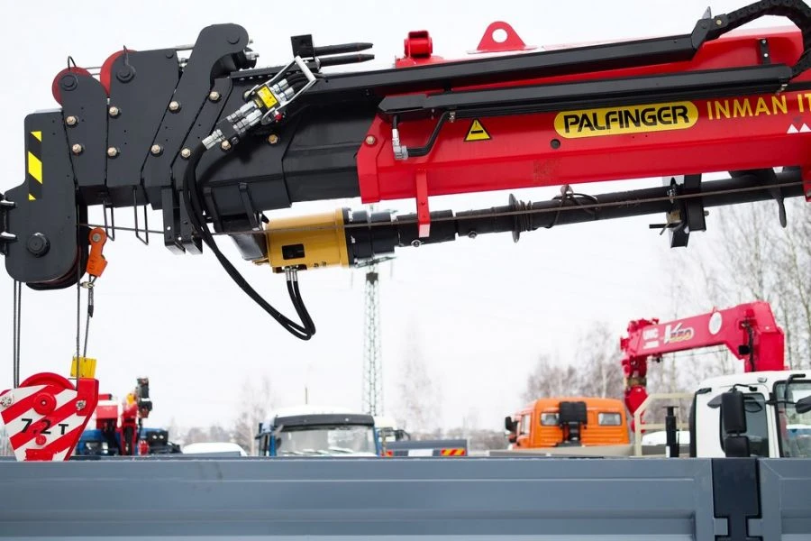 Special-purpose vehicle with hydraulic loading crane of MKMA type on the basis of KAMAZ 65117 and its modifications 64K06N-UM