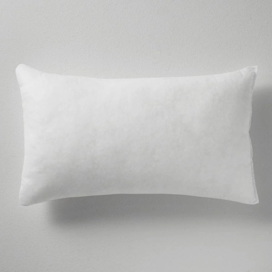 Pillow with synthetic fibre filling