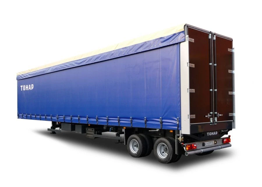 Semi-trailer of cargo model Tonar 974615 with axles manufactured by TONAR of models: 90422, 90424, 90431