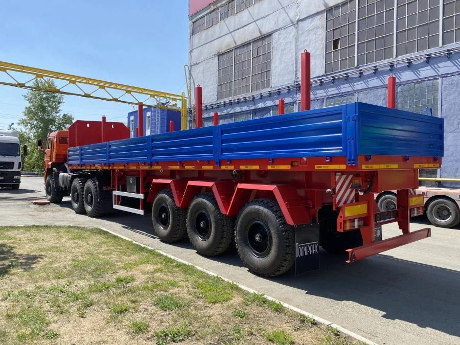 Semitrailer Politrans 94171-0000010. In version: metal platform with decking on spring suspension.