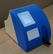 IVD analyser for reading and processing colour information from sensor zones of biochemical test strips with manual test strip f