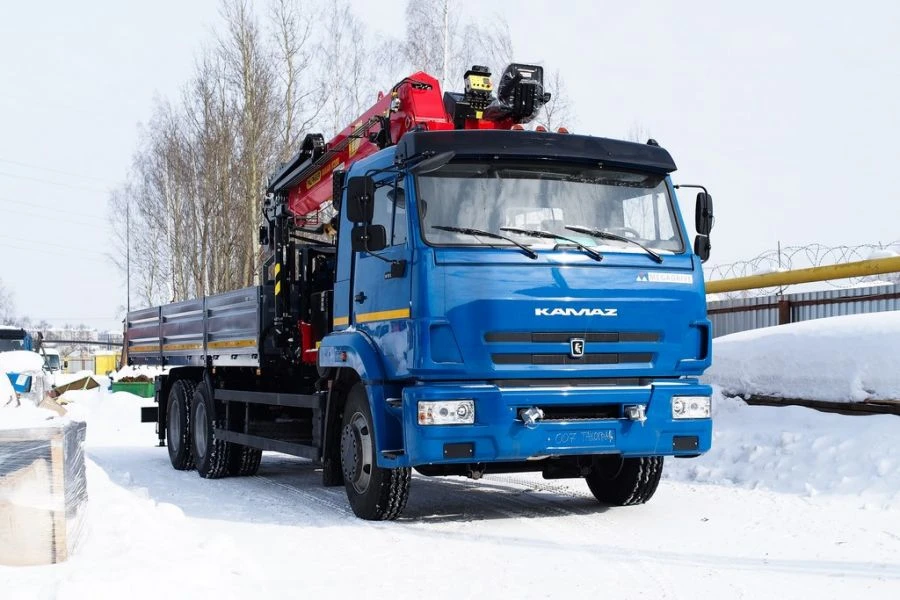 Special purpose vehicle with hydraulic loading crane of MKMA type on the basis of KAMAZ 65117 and its modifications 64K06N-UG