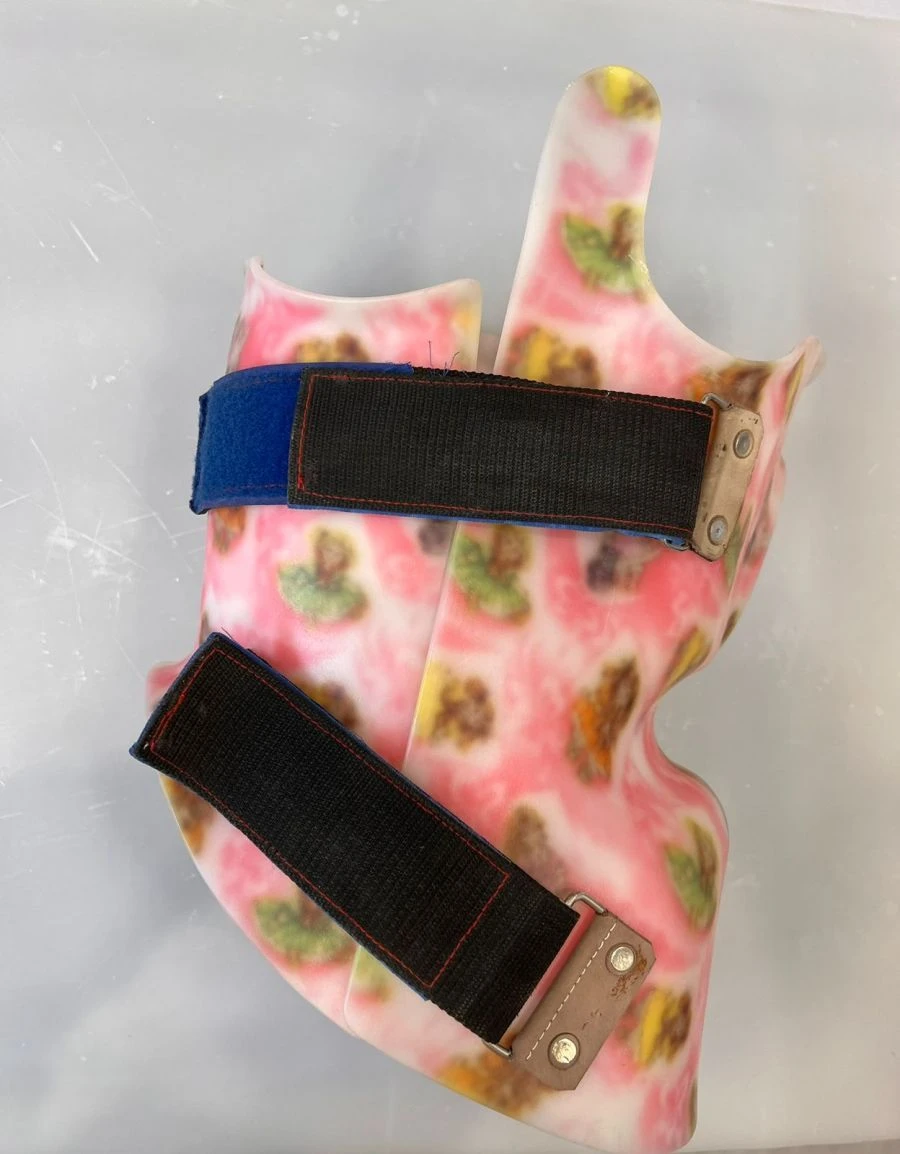Rigid fixation corset