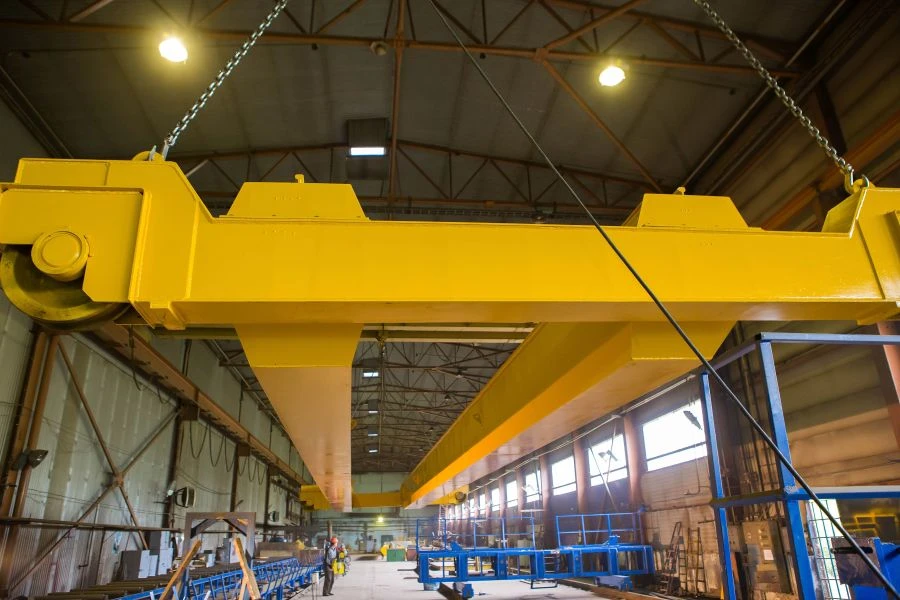 General purpose electric overhead travelling cranes with lifting capacity from 5 to 100/20 tonnes.BC