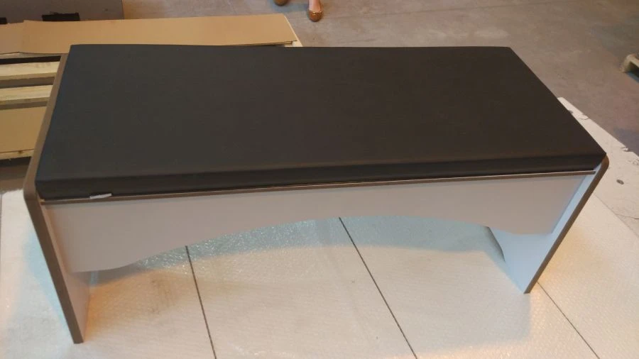Bench with upholstered seat made of HPL plastic