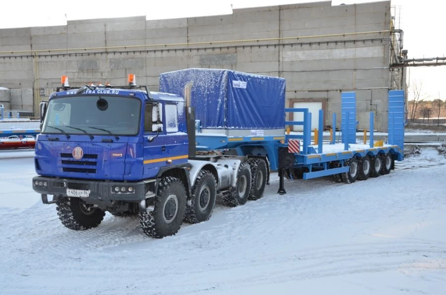 Semitrailer Politrans 94165-040. In the version: metal platform with pneumatic suspension. Axles manufactured by Plant Ltd.