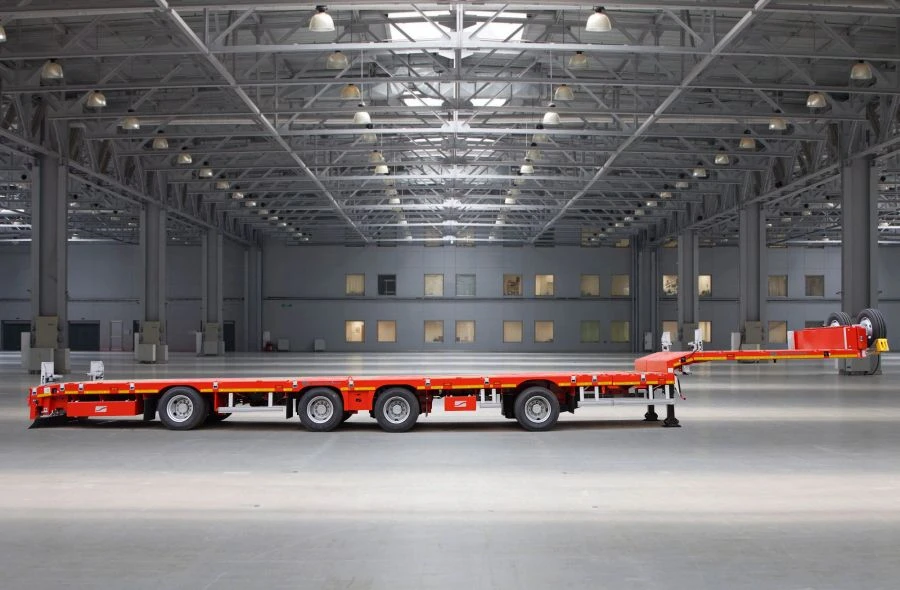 Semitrailer Tverstroimash 993941 modification 0022 straight platform sliding lengthwise with independent steering control
