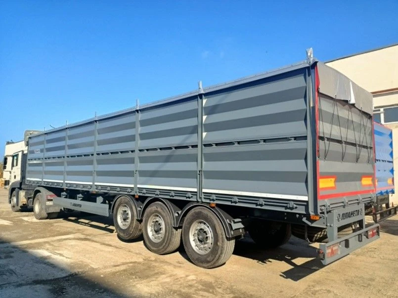 Flatbed semi-trailer 552940 (with pneumatic suspension, tyres of tyre size 385/65R22.5 TYREX_ALL_STEEL, TR-1 b/w)