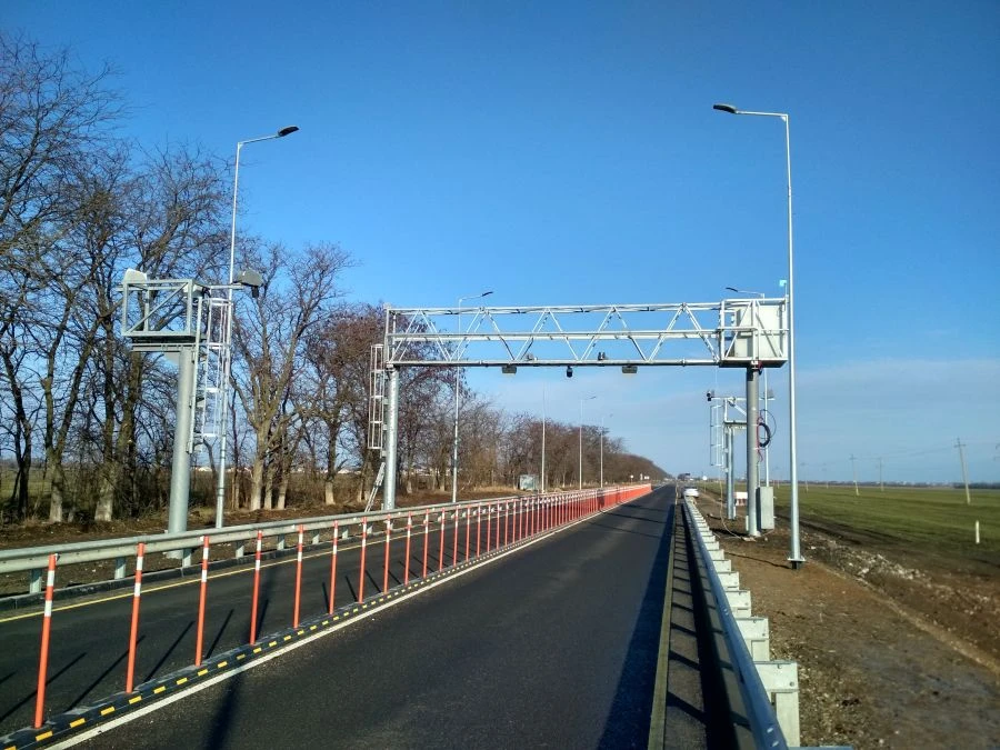 Automatic point of weight and dimensional control of vehicles in motion (APVGK ITS-Siberia)