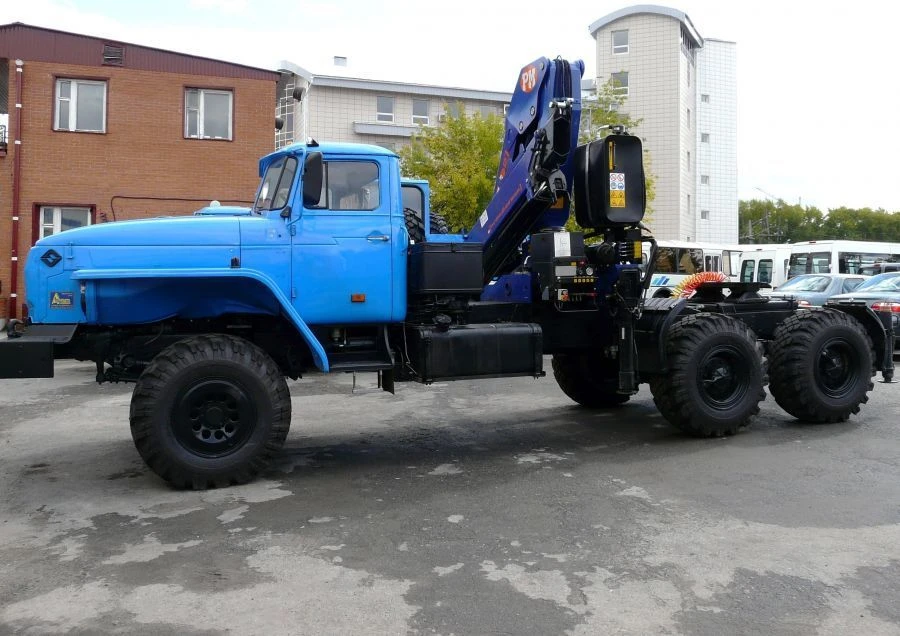 Special purpose vehicle with hydraulic loading crane of KMA type on the basis of URAL 4320, 5557 and its modifications U0K01N-4L