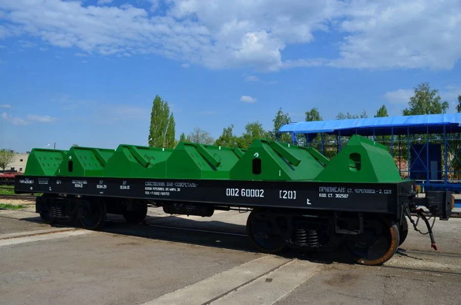 Flat wagon for rolled sheet metal in coils, model 13-9906-01