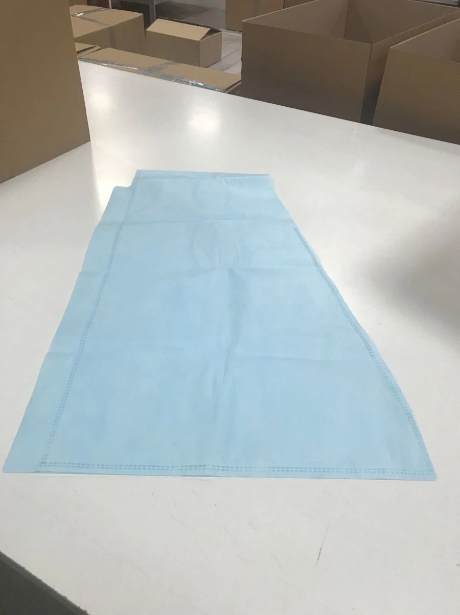 High shoe covers, part of the Set of obstetric linen for women in labour made of nonwoven material disposable sterile CBD "G".