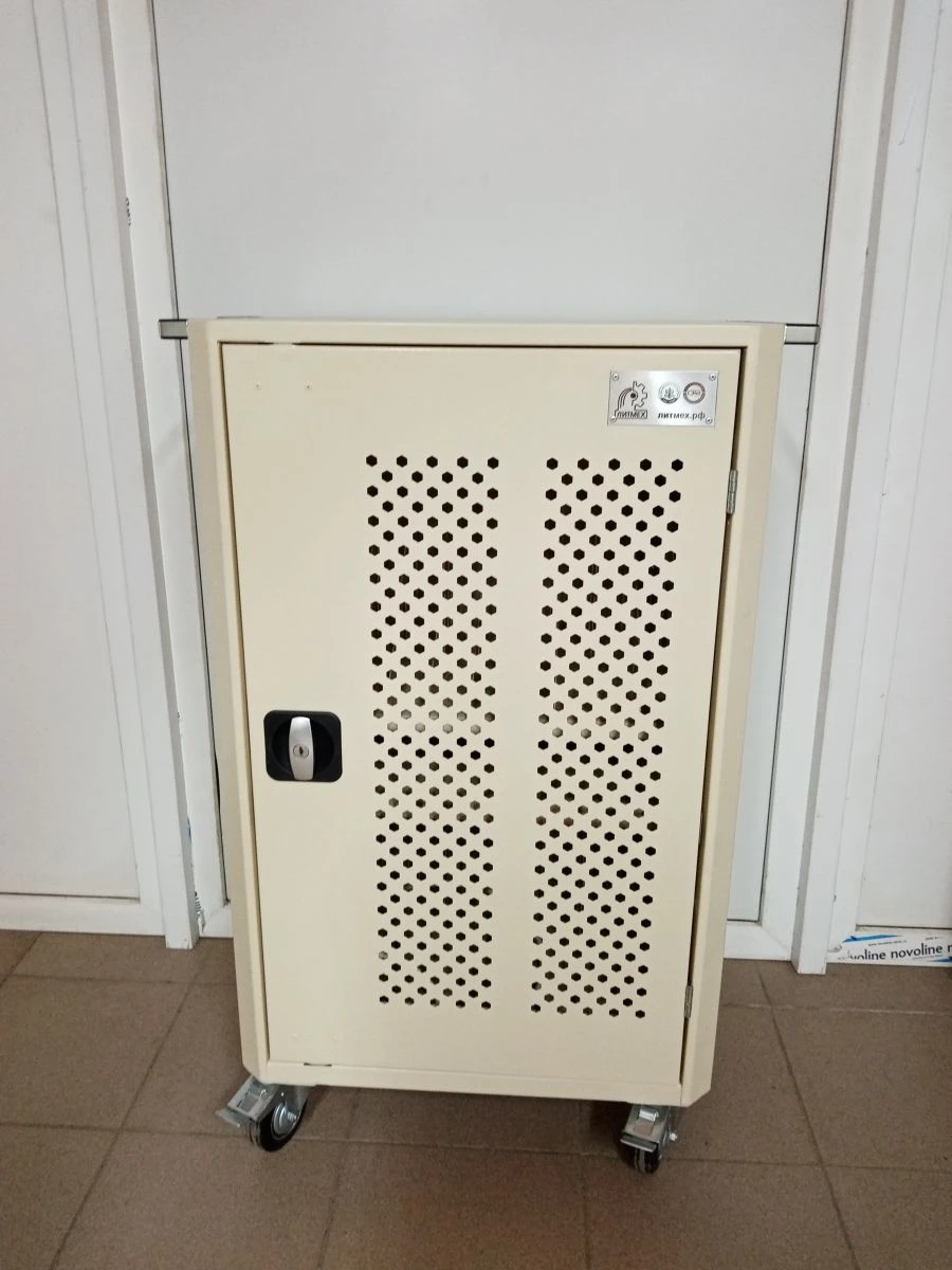 Cabinet (trolley, rack) for storing and charging laptops, tablets, mobile and cellular phones