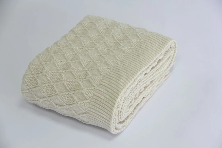 Plaids of fine wool with "AZHUR-TEX" "AZHUR-WOOL" marking