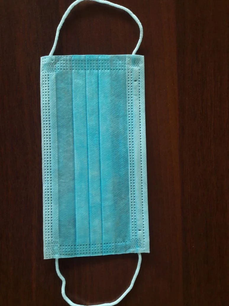 Medical non-sterile disposable mask made of nonwoven materials, three-layered