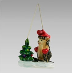 Handmade glass Christmas tree toy "Hedgehog on skis at the Christmas tree"