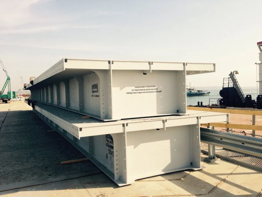 Ferrous metal bridges and bridge sections
