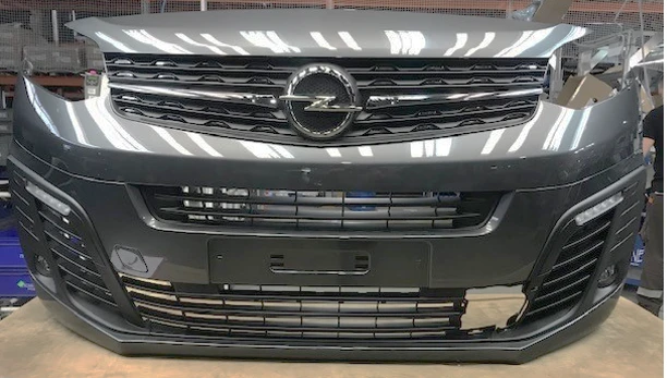 Opel front bumper, passenger version with PTFs, DRLs and parking/blind spot sensors,98362847* (where * is a symbol for all possi