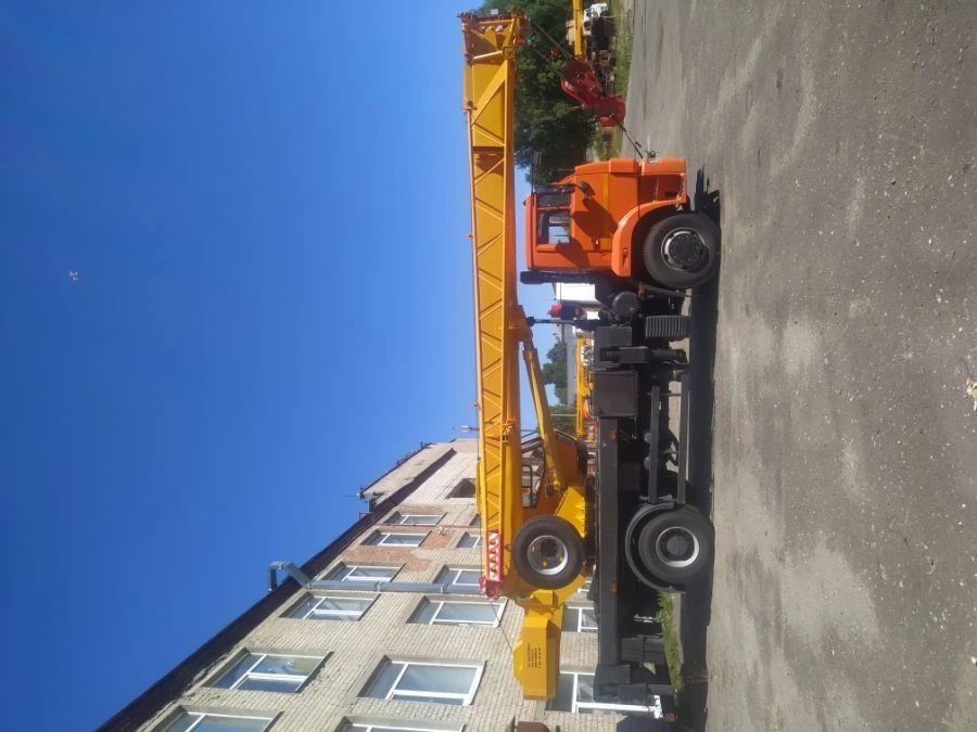 Truck crane KS-45717K-4 and its modifications with the use of cabin U2.65.52.000 and its modifications manufactured by IMZ AVTOK