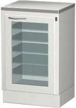 Medical cabinet for storage of sterile instruments with sliding shelves and bactericidal irradiator.