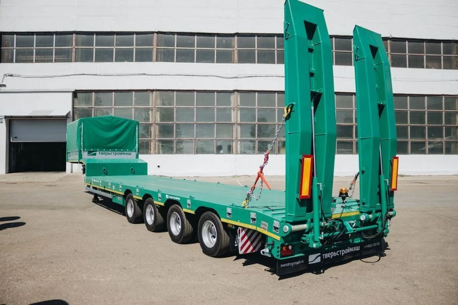 Semitrailer Tverstroimash 993941, modification 0012, variant - platform with mechanical ladders and extensions.